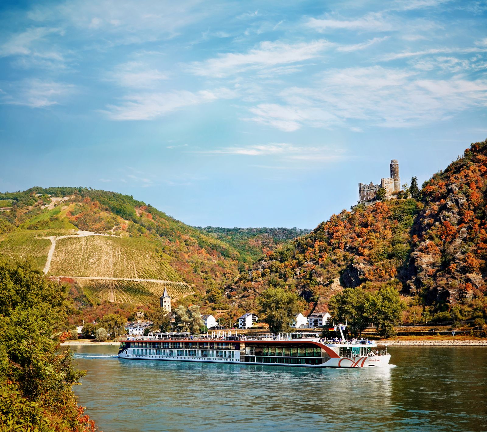 AmaWaterways ship AmaSiena on the Rhine below a castle